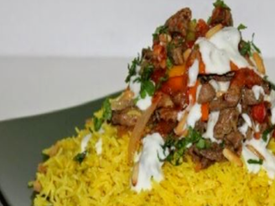 Yellow rice meal with chicken shawarma