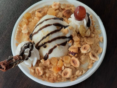Rice pudding with ice cream and nuts