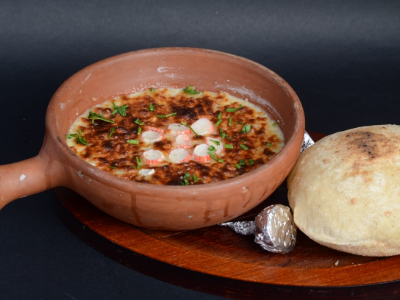 Ares El Karasna With White Sauce And Mushroom Casserole