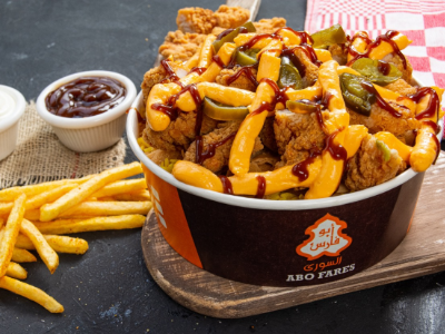 Crispy Chicken Fatteh With Cheddar Cheese And Barbecue Sauce