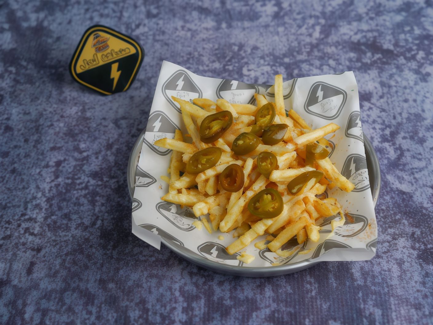 French Fries Packet With Cheese And Jalapeno