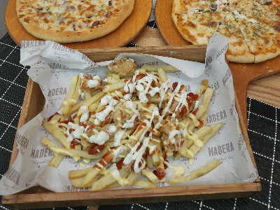 French fries with chicken and cheese