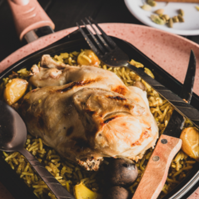 نصف دجاجة مع رز كدرة