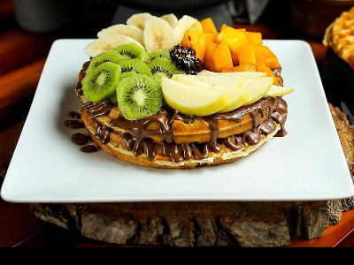 Nutella Chocolate With Chocolate Sauce And Fruits With Ice Cream Waffle