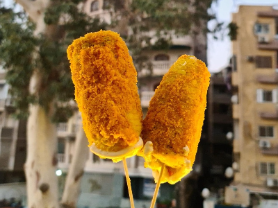Sweet Corn With Cheetos And Cheddar Cheese