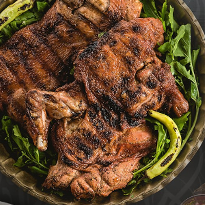 Quarter grilled chicken dish
