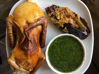 Stuffed Roasted Pigeon With Rice And Molokhia