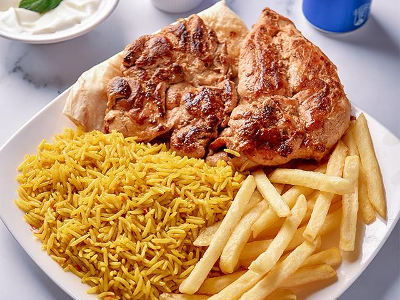 Half Grilled Chicken On Charcoal