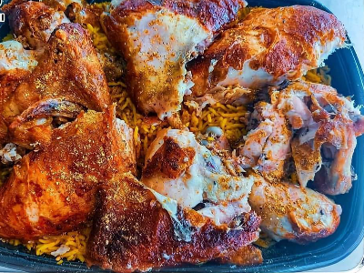 Half Grilled Chicken On Charcoal On The Syrian Way