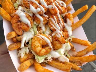 French Fries With Cheese And Fried Shrimp