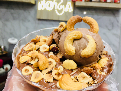 Rice Pudding With Nutella And Ice Cream And Nuts