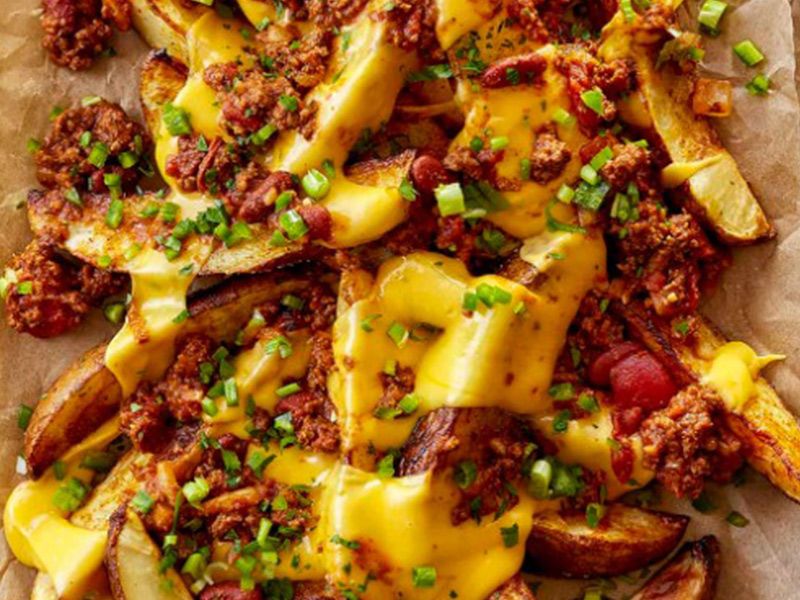 French Fries With Cheese And Chili Pepper