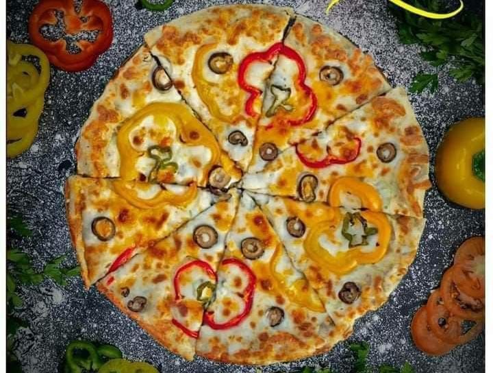 1 sausage Hawawshi wesh pizza