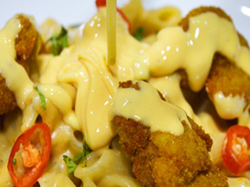 Pasta With Crispy Chicken And Cheese Sauce