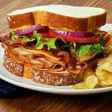 Smoked Turkey Club Sandwich With Cheddar Cheese