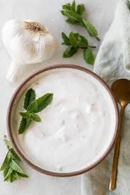 Garlic dip with toasted bread