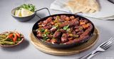 Oriental Sausage With Pomegranate Molasses