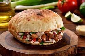 Foul With Sausage Or Foul With Egg
