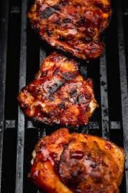 Quarter chicken breast grilled on charcoal