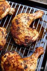 quarter chicken thigh on grill with extra