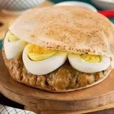 Beans with boiled eggs