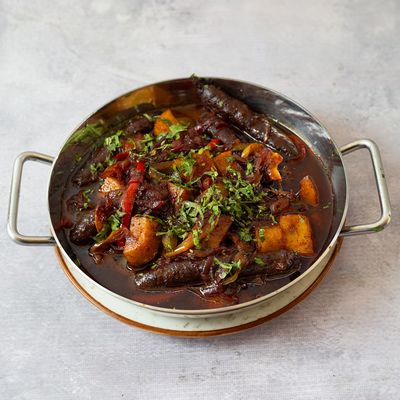 Sausage with pomegranate molasses and potatoes Pan