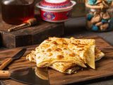 Feteer Meshaltet With Qeshta And Honey