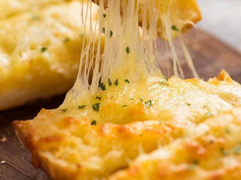 Garlic Bread With Mozzarella Cheese And Black Olives