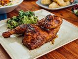 Half A Chicken Grilled On Charcoal