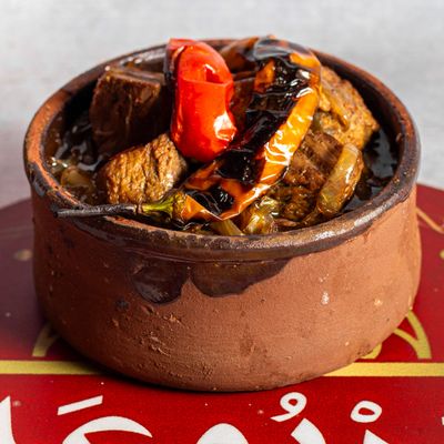 Meat Casserole With Onions And Sauce With Bread