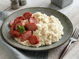 MASHED POTATOES WITH SMOKED SAUSAGE CHEDDAR SAUCE