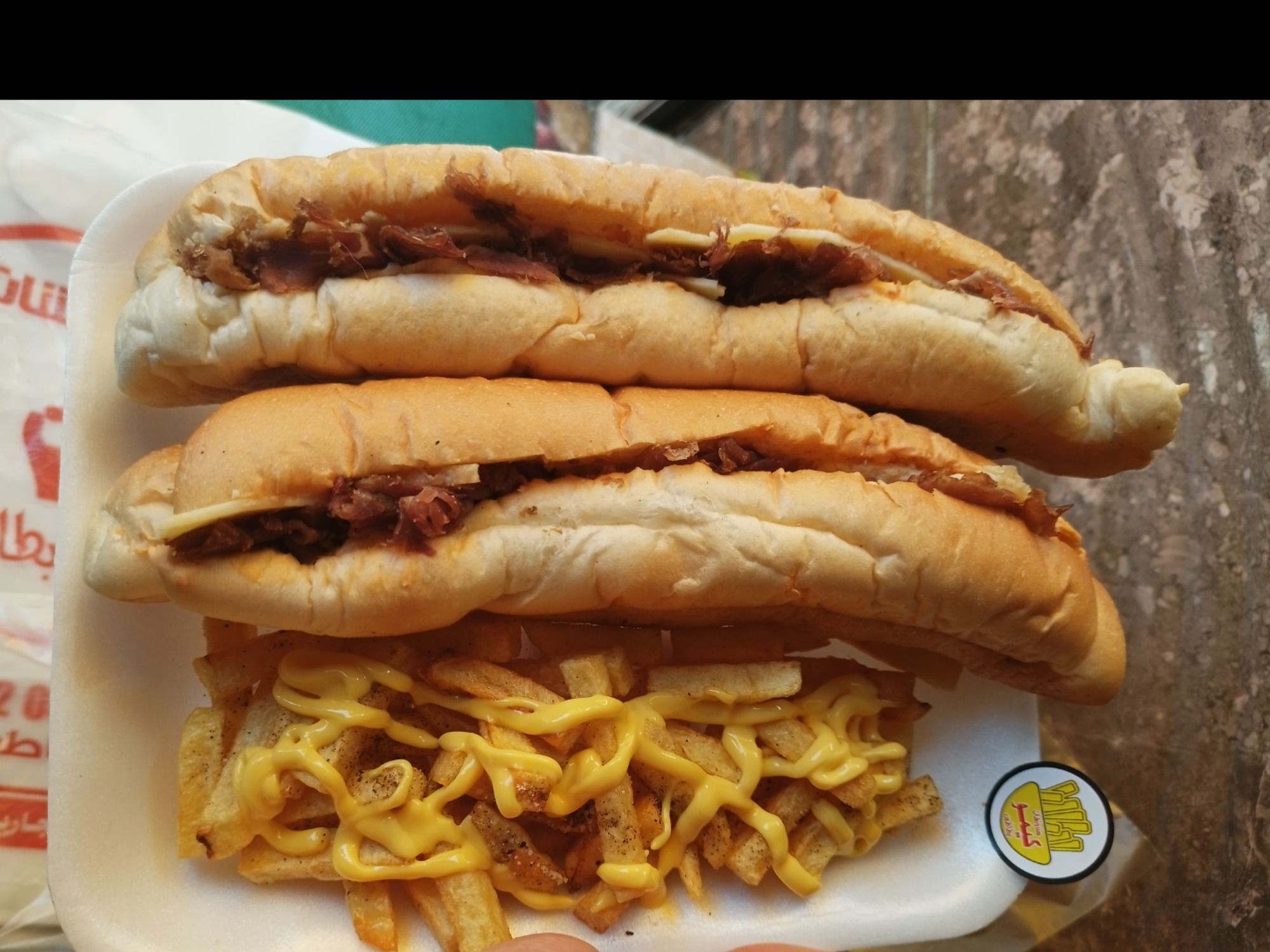 Breakfast Offer: 2 sandwich roumi with pastrami Nesto cheese and fries and cheddar sauce