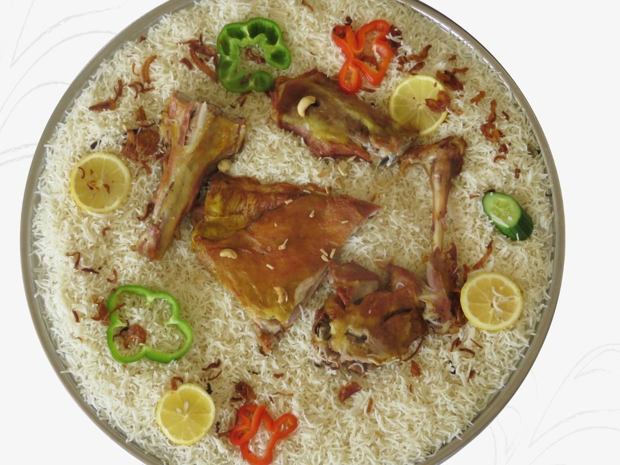 Quarter Teis Mandi With Rice And Sauce