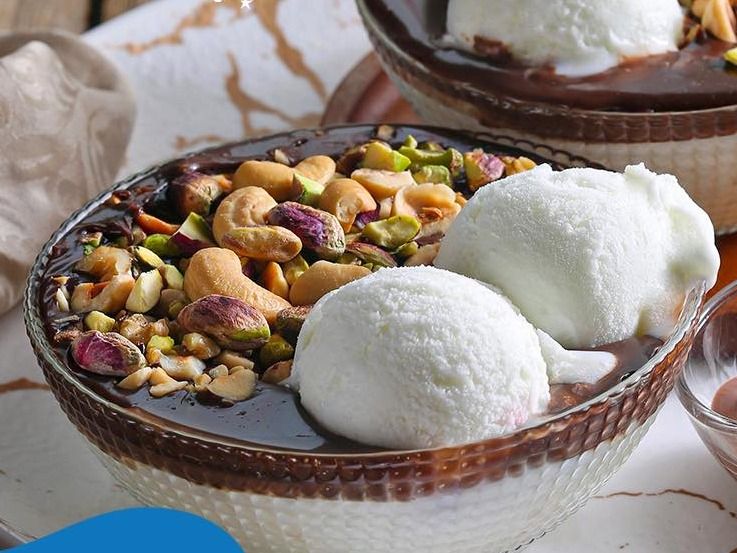 Rice Pudding With Nutella And Ice Cream And Nuts