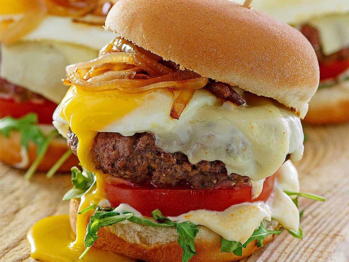 Burger With Eggs And Cheddar Cheese Sandwich