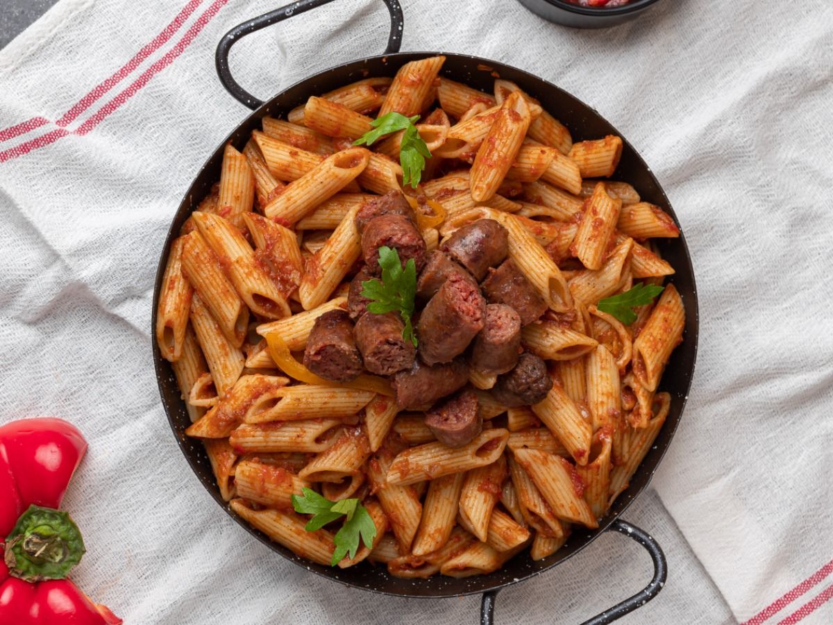Pasta with sauce and Oriental sausage