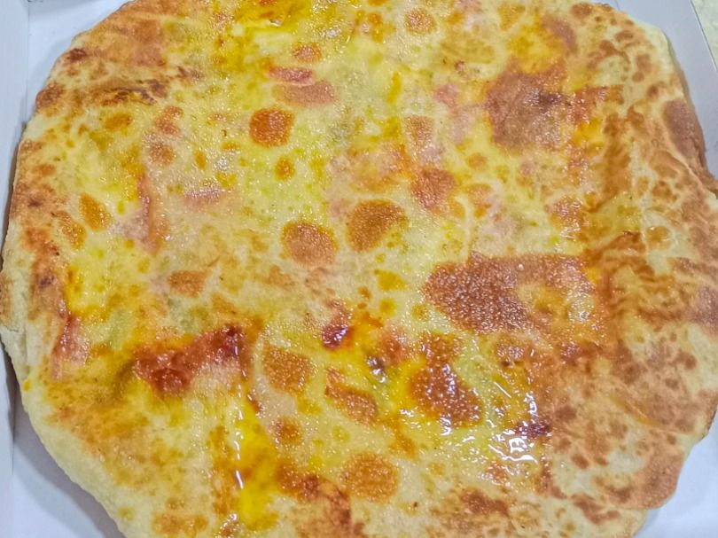 Local sausage pie with Kiri