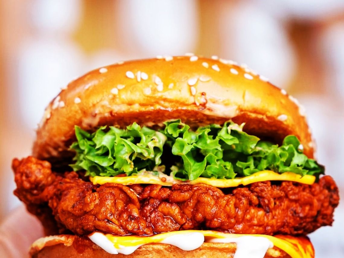 Zinger Sandwich With Hot Sauce And Fries