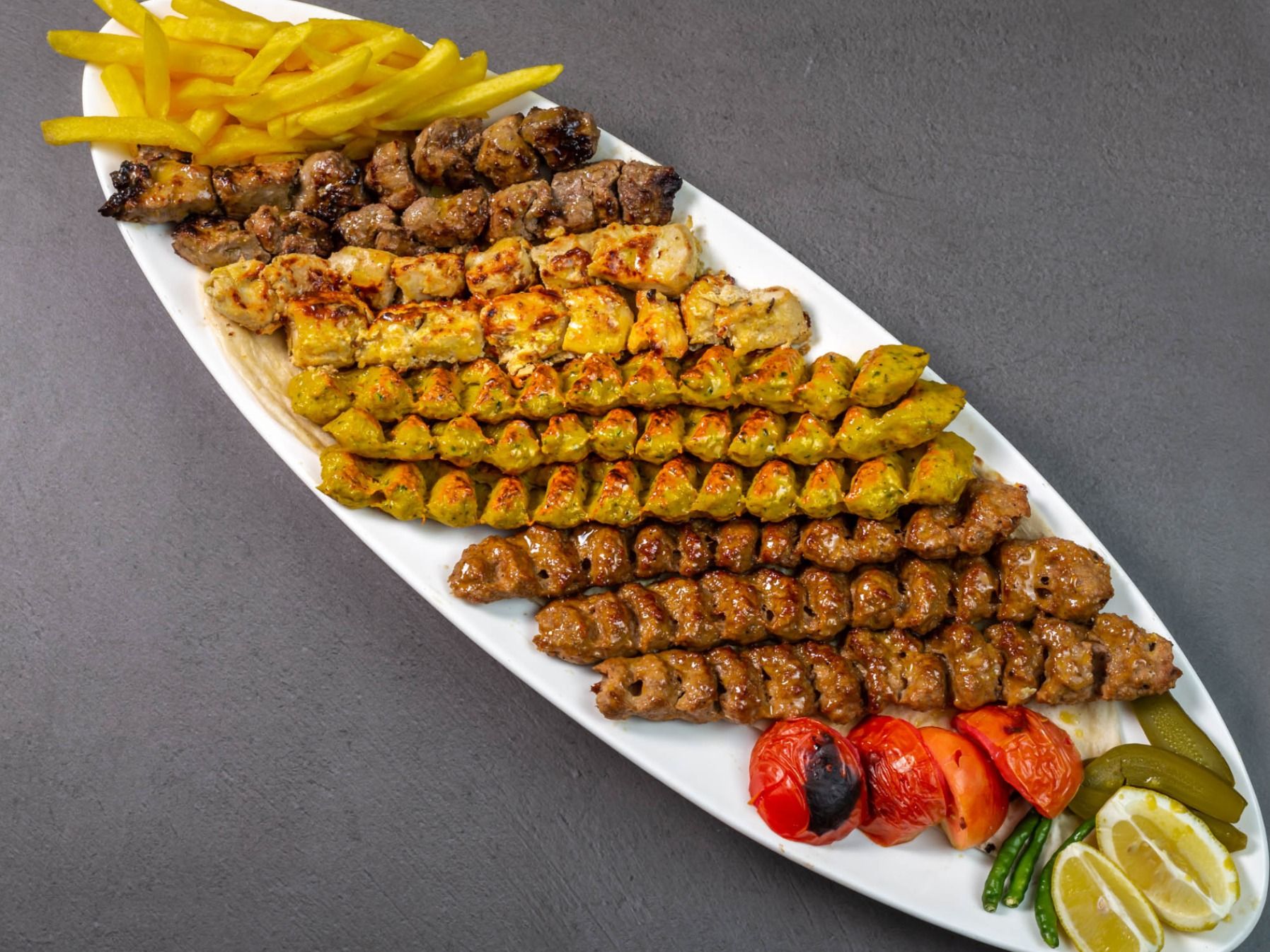 Al Manqal Kitchen Feast delivery service in Qatar | Talabat