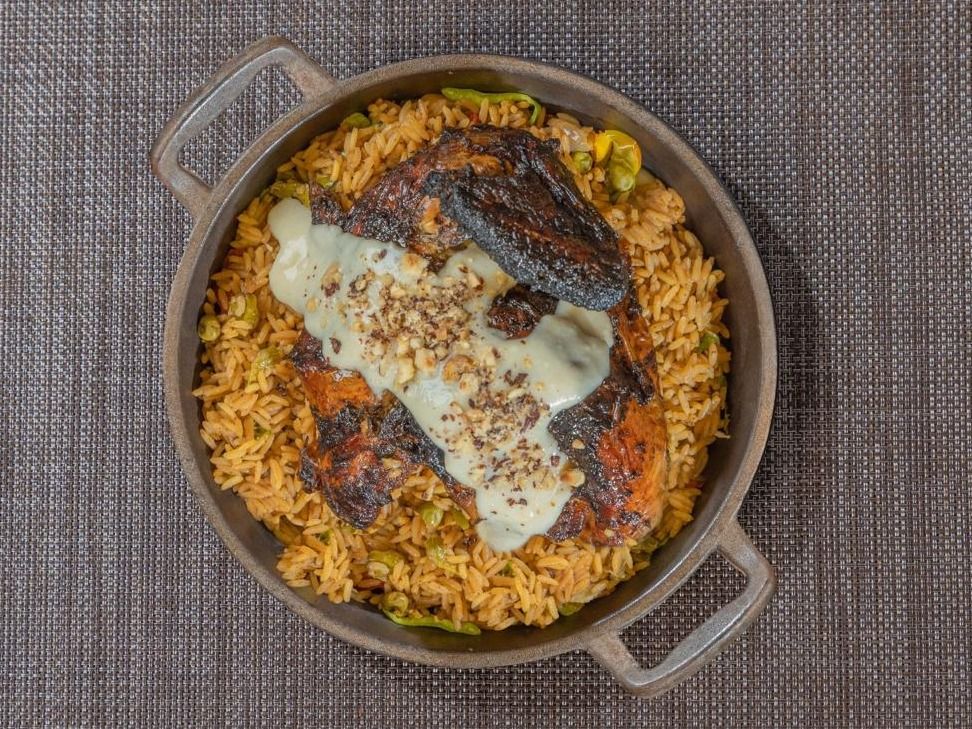 Half Stuffed Chicken With Rice And Vegetables