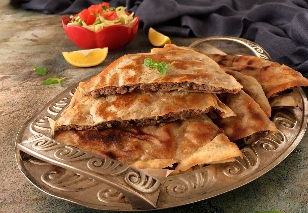 Bread with meat on charcoal