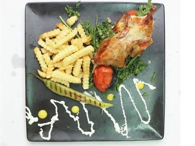 Stuffed Pigeon With Fries