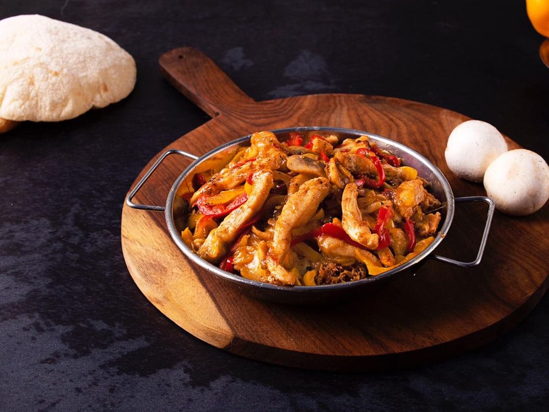 Chicken fajita bowl and mix cheese