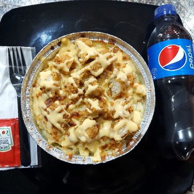 Chicken Crispy Pasta With Mozzarella And Cheder Cheese With Pepsi