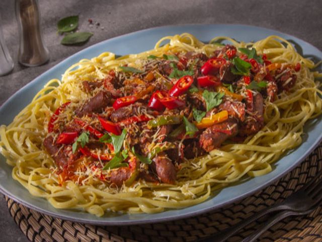 Spaghetti Pasta With Tomato Sauce And Sausage