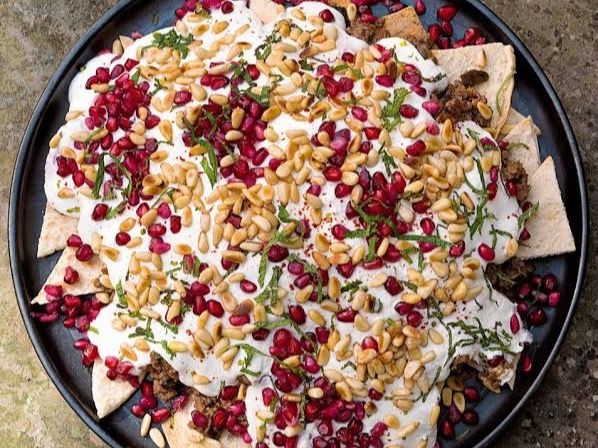 Lebanese fatteh with lamb meat and pine nut