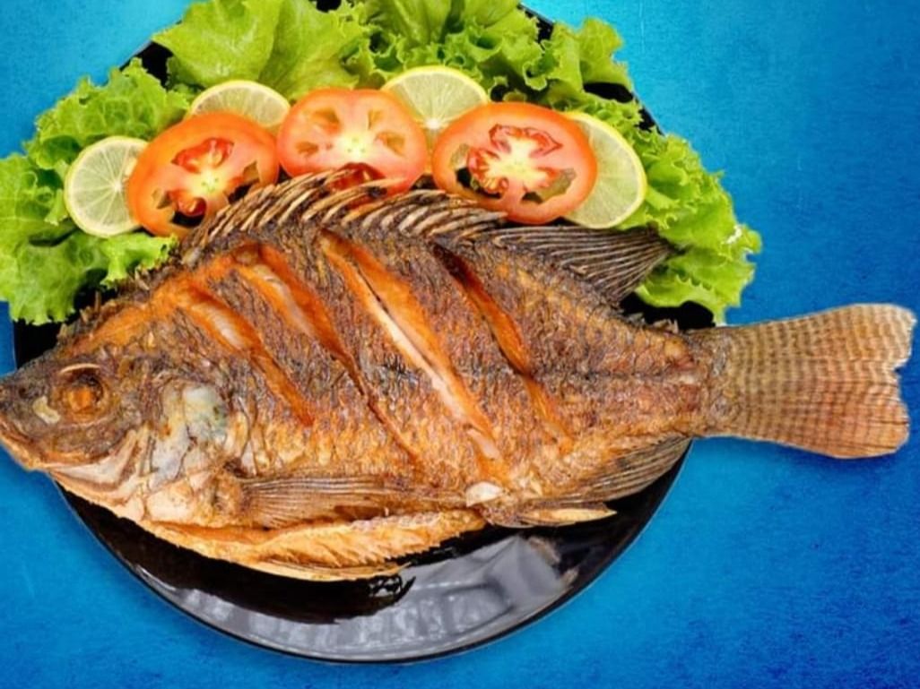 Tilapia Fish With Seafood Soup Meal
