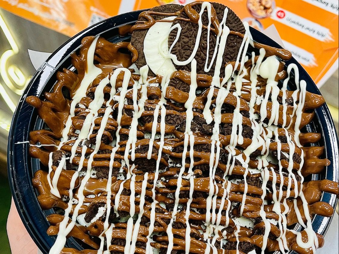 Rice Pudding With Oreo And Nutella And White Cho