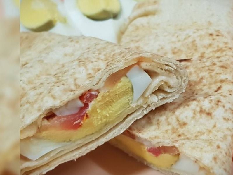 Omelet Sandwich With Potatoes And Cheese