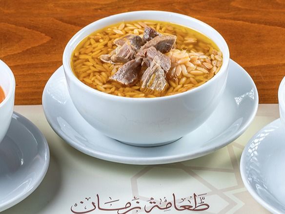 Orzo soup with veal pieces